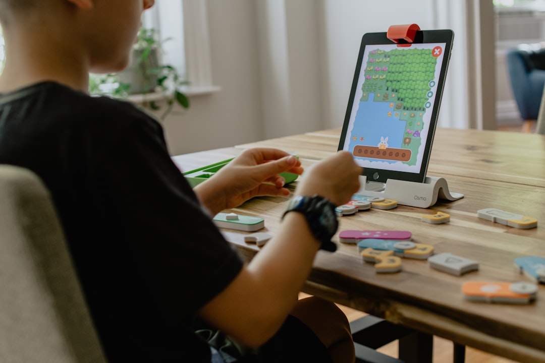 Mastering the First Impression: Your intriguing post title goes here Boy practicing kids coding app on iPad